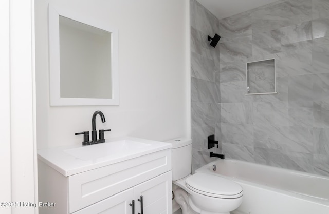 full bathroom featuring shower / washtub combination, vanity, and toilet