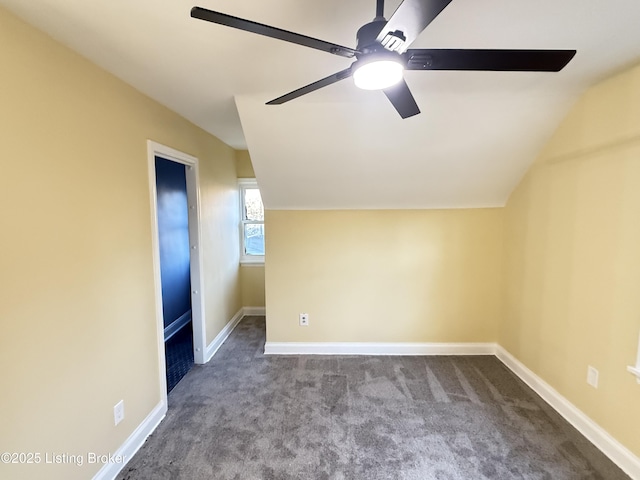 bonus room with ceiling fan, carpet flooring, and vaulted ceiling