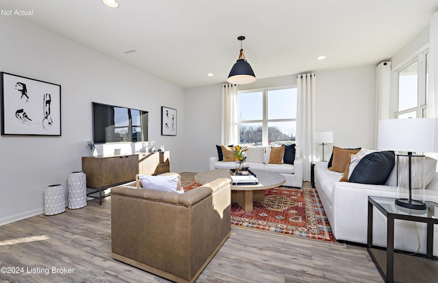 living room with light hardwood / wood-style flooring