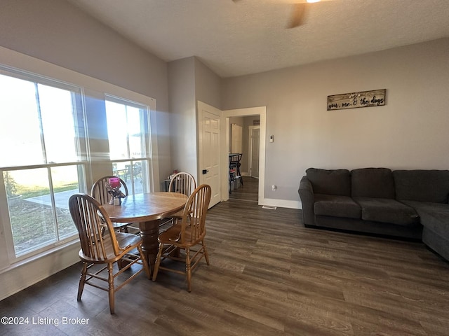 dining space featuring dark hardwood / wood-style floors