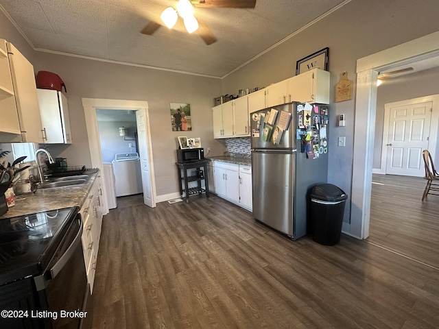 kitchen with white cabinetry, washer / dryer, sink, and black appliances