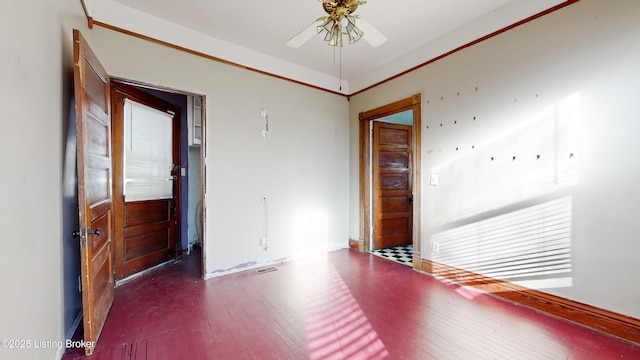 unfurnished room with wood-type flooring and ceiling fan