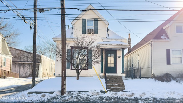 view of front of property with cooling unit