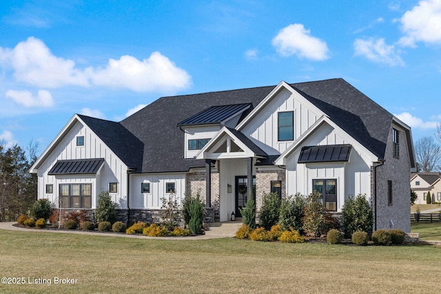 modern farmhouse featuring a front lawn