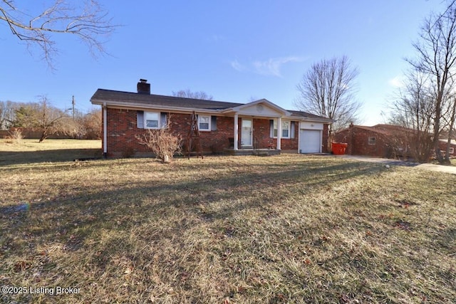 ranch-style home with a garage and a front yard