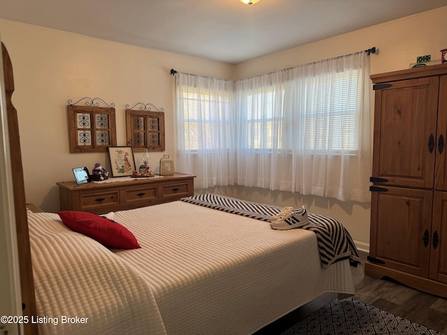 bedroom featuring hardwood / wood-style flooring