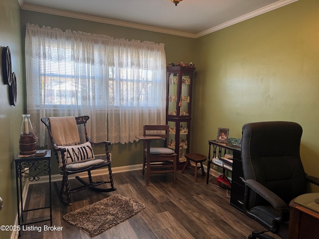 sitting room with ornamental molding and dark hardwood / wood-style floors