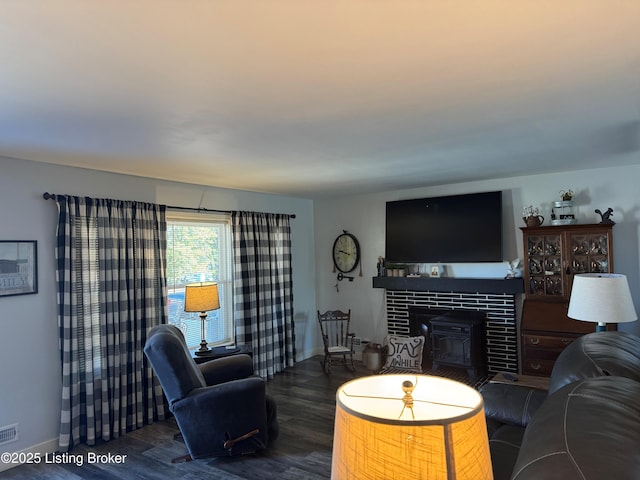 living room with dark hardwood / wood-style floors