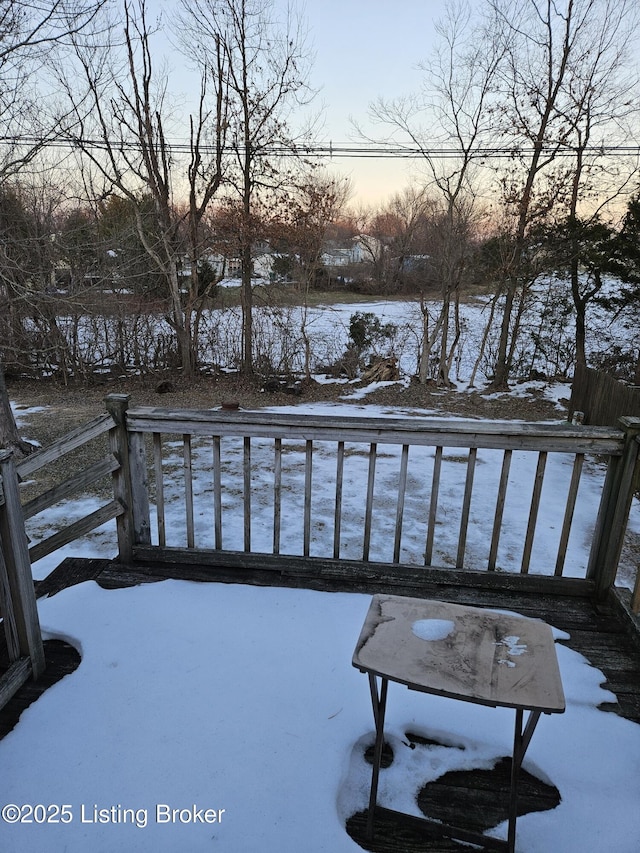 view of snow covered deck