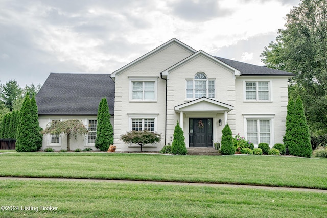 view of front facade with a front lawn