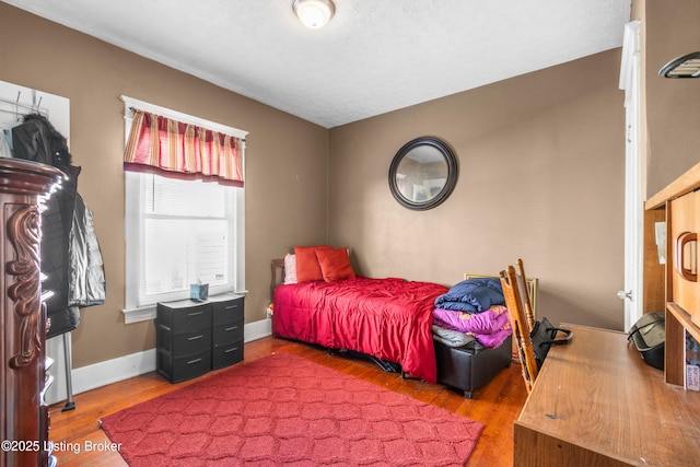 bedroom featuring hardwood / wood-style floors