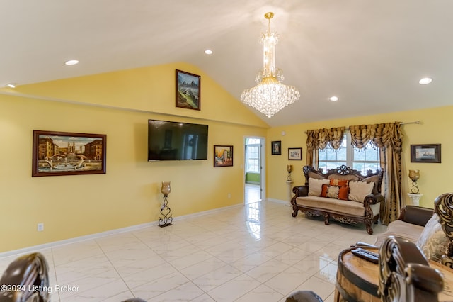 living room with lofted ceiling and an inviting chandelier