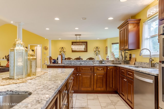 kitchen with sink, ornate columns, decorative light fixtures, dishwasher, and light stone countertops