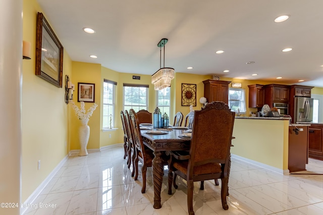 dining space with plenty of natural light