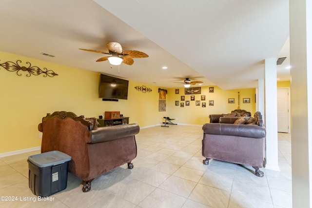 tiled living room with ceiling fan