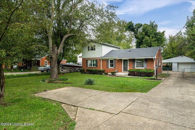 view of front facade featuring a garage and a front lawn