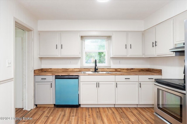 kitchen with sink, stainless steel range with electric cooktop, white cabinetry, wooden counters, and dishwashing machine