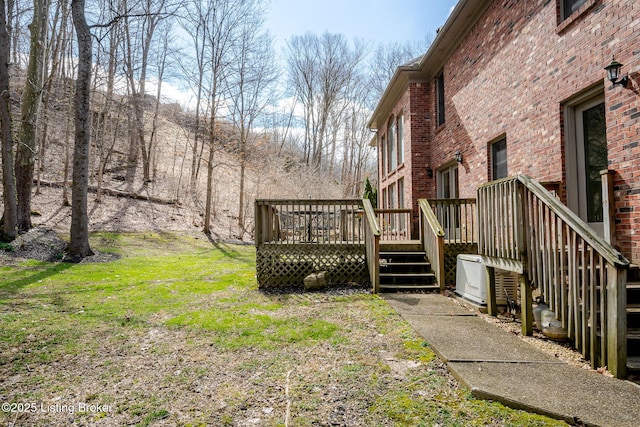 view of yard featuring a deck