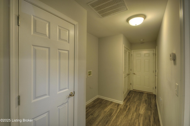 hall featuring dark wood-type flooring