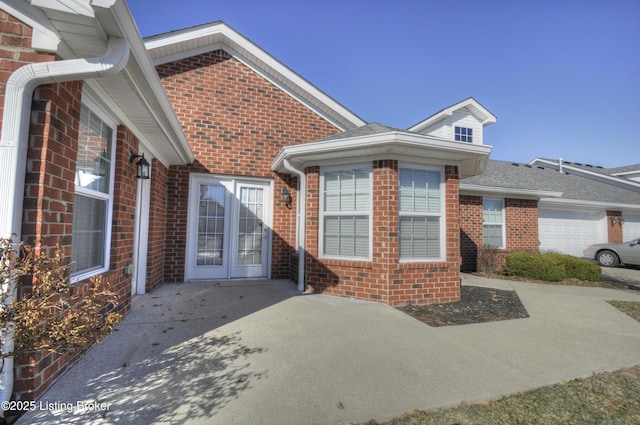 property entrance featuring a garage