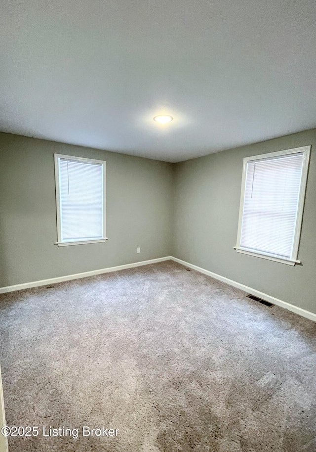 view of carpeted spare room