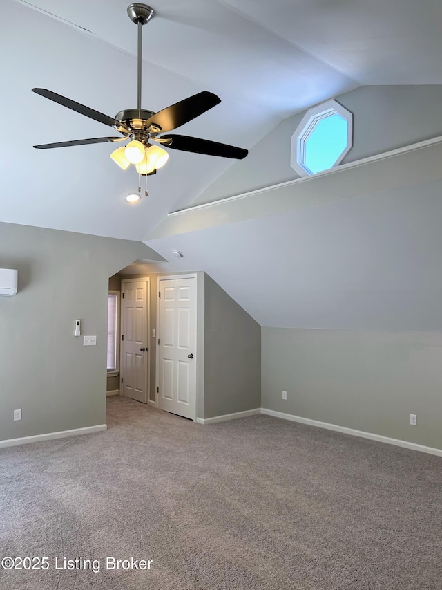 additional living space featuring vaulted ceiling, carpet floors, and ceiling fan