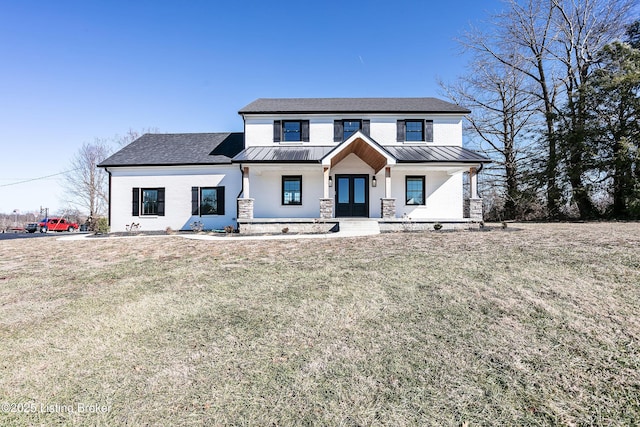 modern farmhouse style home with a porch and a front yard