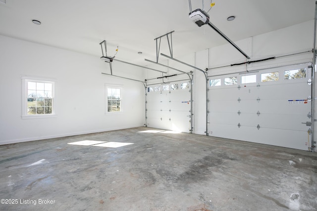 garage featuring a garage door opener