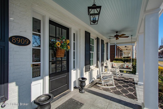 view of patio / terrace featuring ceiling fan and covered porch