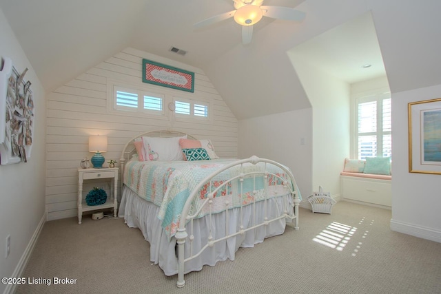 bedroom with carpet floors, ceiling fan, and vaulted ceiling