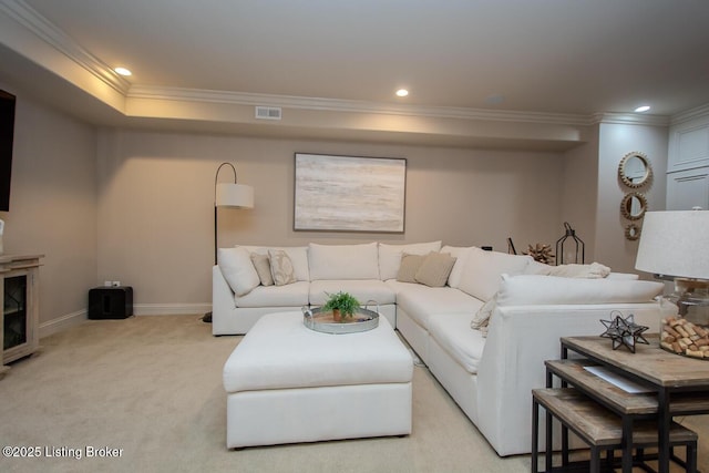 living room featuring ornamental molding and light carpet