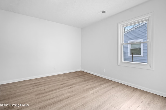 empty room featuring light hardwood / wood-style flooring