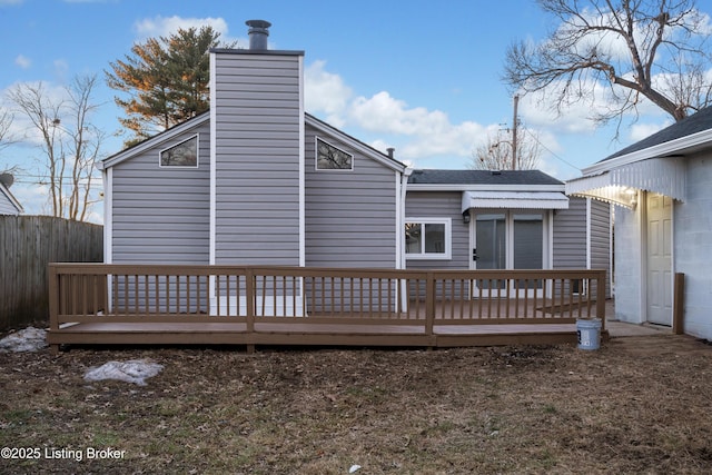 rear view of property with a deck