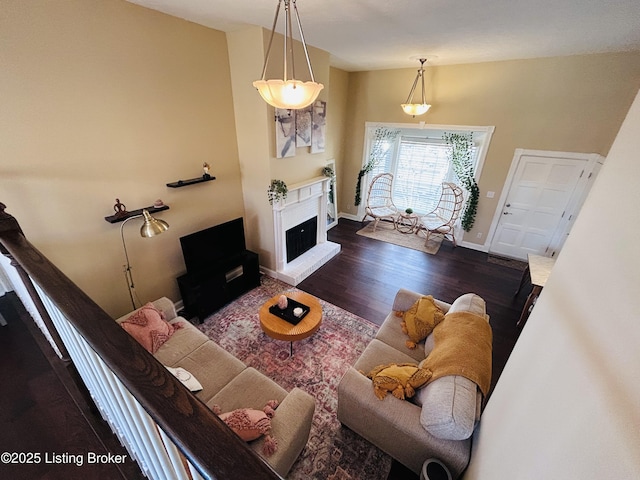 living room featuring dark wood-type flooring