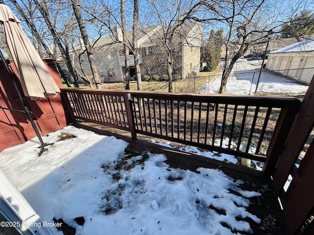 view of snow covered deck