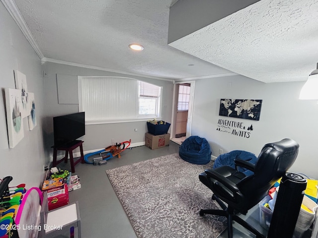 rec room featuring crown molding, concrete flooring, and a textured ceiling