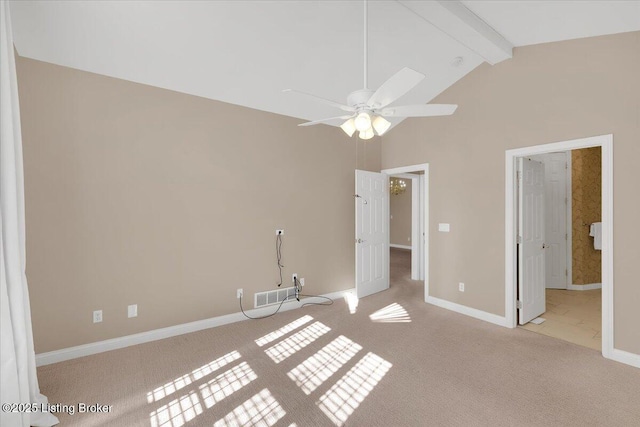 unfurnished bedroom featuring baseboards, visible vents, light colored carpet, beamed ceiling, and high vaulted ceiling