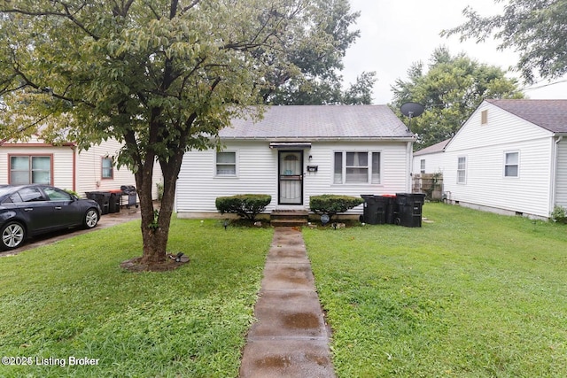 view of front of home with a front yard