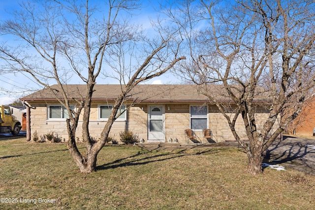 ranch-style home with a front lawn