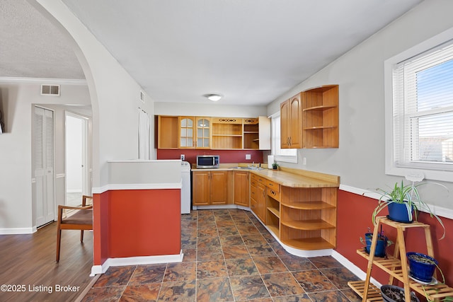 kitchen with dishwashing machine and sink