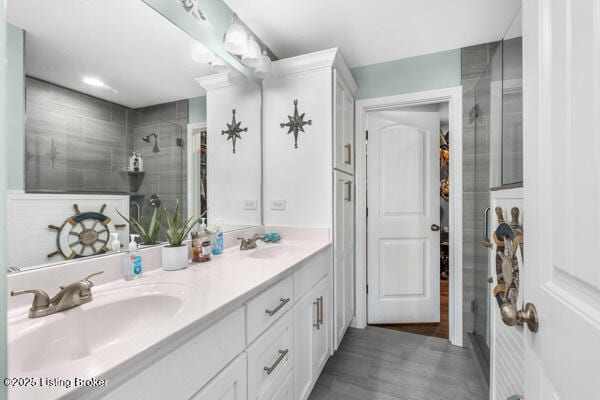 bathroom featuring vanity and walk in shower