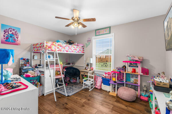 bedroom featuring dark wood-type flooring and ceiling fan