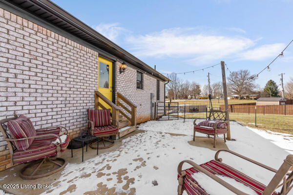 view of snow covered patio