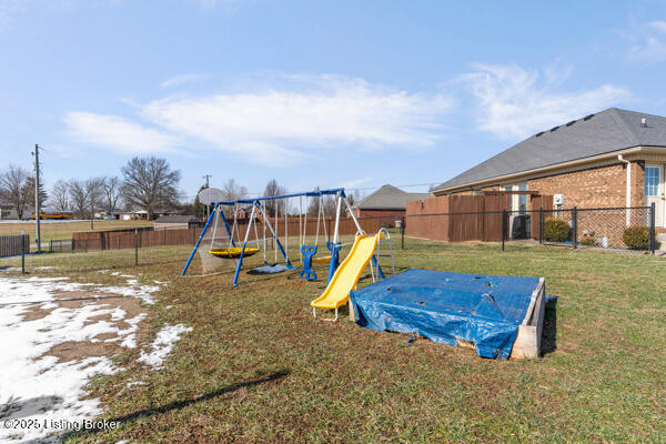 view of jungle gym with a yard