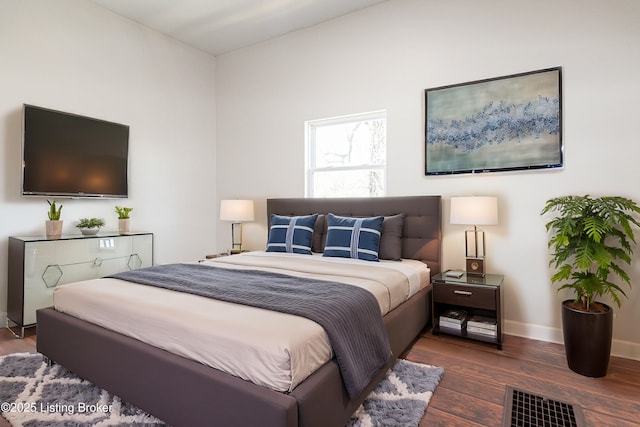 bedroom featuring dark hardwood / wood-style floors