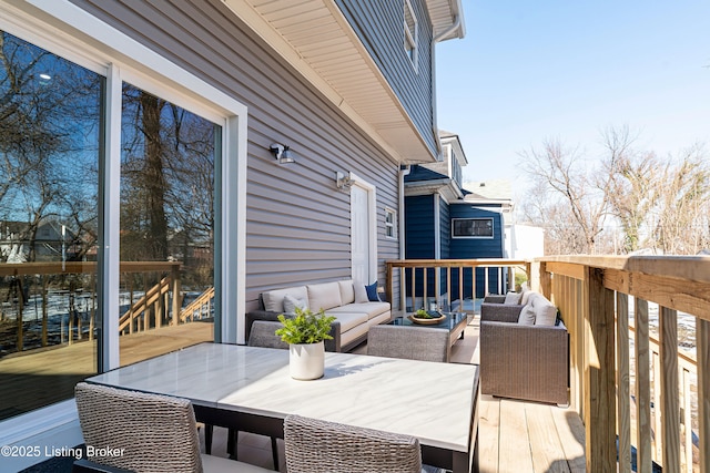 wooden deck featuring an outdoor living space