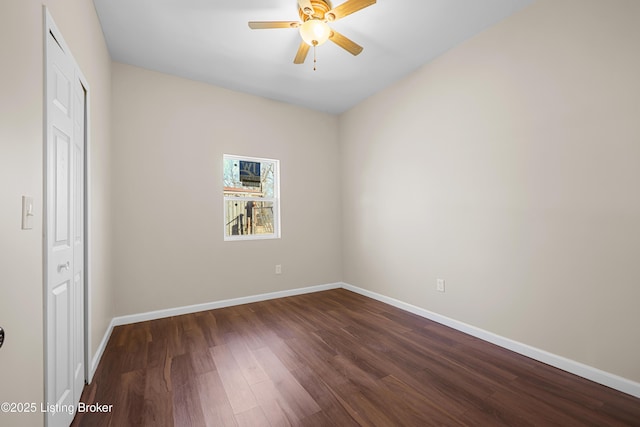 unfurnished bedroom with dark hardwood / wood-style floors and ceiling fan