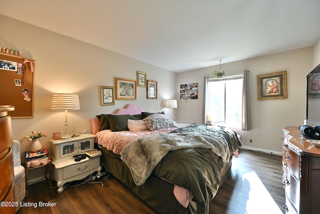 bedroom featuring dark hardwood / wood-style floors