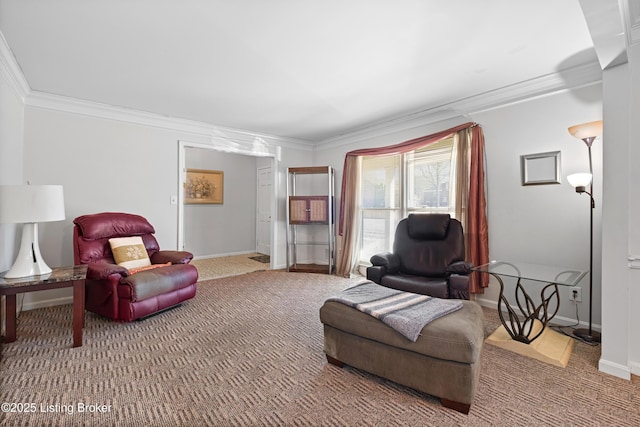 sitting room with ornamental molding and carpet flooring