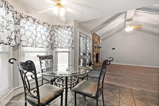 dining area with lofted ceiling and ceiling fan